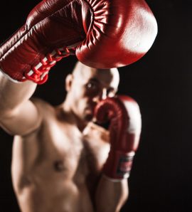 the-young-man-kickboxing-on-black-PQR5ZQ7.jpg